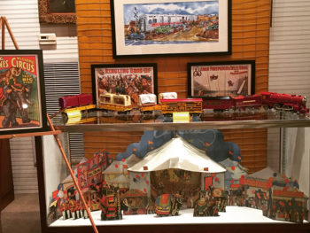 Model train display and vintage railroad artwork